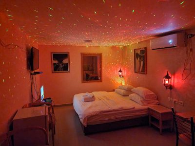 Multimedia corner with TV screen and sitting area in hotel suite